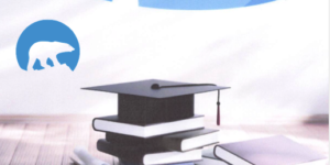 GNWT Logo Graduation Hat on top of a stack of books